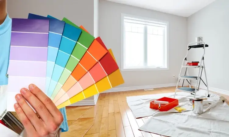 Interior painting preparation with color palette and paint tools by Aghata Painting Services